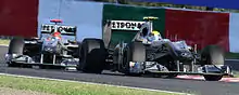 Nico Rosberg leads teammate Michael Schumacher at the 2010 Japanese Grand Prix