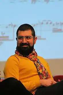 Rowshan in a panel discussion at 2019