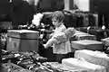 Immigration: a child with a doll in Ben Gurion Airport, 1973