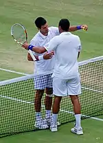 Tsonga and Djokovic embrace post their match.