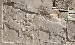 Bas-relief in Persepolis—a symbol in Zoroastrian for Nowruz— eternally fighting bull (personifying the moon), and a lion (personifying the Sun) representing the Spring