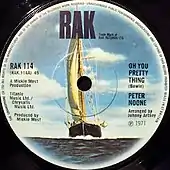 An LP label with a sailboat