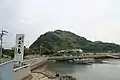 View from Ōzushima Port, with a sign saying "Welcome to Kaiten Island, Ōzushima"