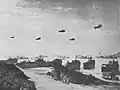 View of Barrage balloons above Omaha Beach on June 24, 1944 as seen by the 291st after arriving from Southampton, England aboard a Landing Ship.