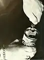 Opening a beer can with a "church key", 1963