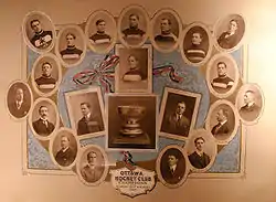  A montage of photographs of the hockey players and team executives surrounding a photograph of the Stanley Cup trophy, with a caption below of "Ottawa Hockey Club, Champions and Stanley Cup holders 1909"