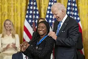 President Joe Biden presenting the Medal to Simone Biles, 2022