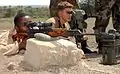 Ethiopian soldier fires a PSL sniper rifle at a shooting range outside Camp Ramrod, Ethiopia.