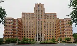 A brick-clad Art Deco-style building