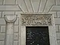 The bas-relief of Saint George and the dragon on the façade south of the square