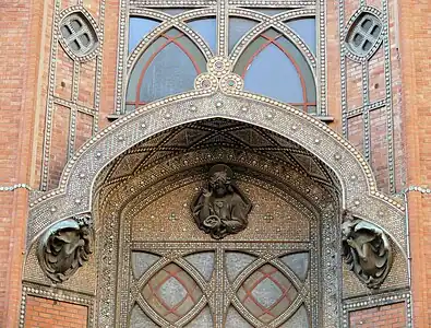 Ceramics and  sculpture over the portal