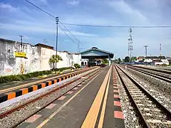 The elevated platform of Pasuruan railway station from the second track, taken in 2023