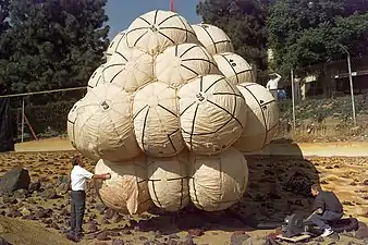 The Mars Pathfinder lander during a ground test encased in its cluster of air bags