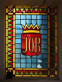 Stained glass JOB emblem