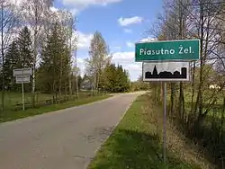 Road sign in Piasutno Żelazne