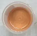 Pinkish urine due to consumption of beetroots.