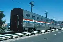 Silver double height railway car