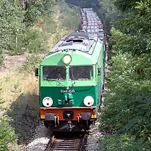 SU46-025 with freight train