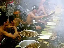 Preparing the feast before a Pandan War performance in Tenganan village, Karangasem Regency, Bali