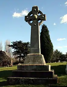 Tall stone Celtic cross on a three-step basis