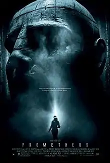 A female figure in silhouette stands before an enormous statue of a humanoid head. Text at the middle of the poster reveals the tagline "The Search for Our Beginning Could Lead to Our End". Text at the bottom of the poster reveals the title, production credits and rating.