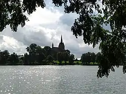 Lake Starzyca and Our Lady of Sorrows church