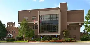 Old and new Pulaski County courthouses in Waynesville