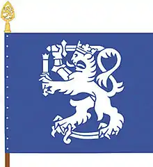 The colour of the Finnish Defence Forces International Centre features a Lion of Finland holding a herald's staff in addition to a sword. The shade of blue is the same as in the flag of the United Nations.