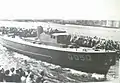 Launching of ML Q050, the first Fairmile of Royal Canadian Navy at Midland Boat Works, Midland, Ontario on August 28, 1941.