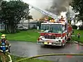 Old Truck 29 extinguishing a house fire