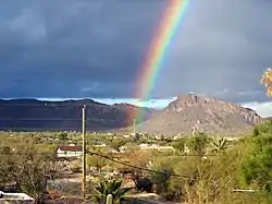 A rainbow appearing after a monsoon in Drexel Heights, Arizona, USA.