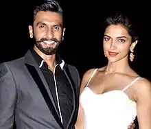 Ranveer Singh and Deepika Padukone smiling for the camera