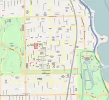 a street map with a portion of a block designated with red borders.  The map also has several large green areas designating undeveloped land.