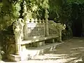 Bench between the lake and the Loggia.