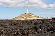 Reykjanesviti lighthouse on Bæjarfell with lighthouse keeper's residence