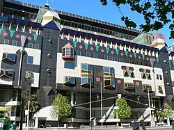 RMIT Building 8 (completed 1993). Swanston Street, Melbourne.  Uses novel decorative elements and references to pop-culture.