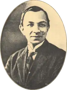 Head-and-shoulders portrait of a Eurasian gentleman in a suit