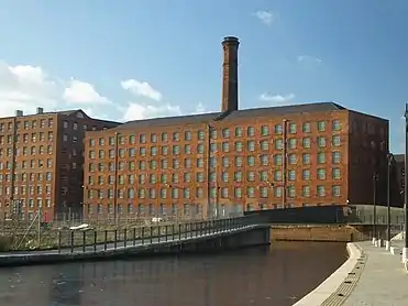 Murrays' Mills (for cotton) on the Rochdale Canal, Manchester, begun in 1798, and then forming the longest mill range in the world