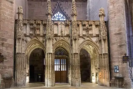 The rood screen, in the south transept (15th c.)