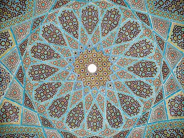 Complex Mosaic patterns also known as Girih are popular forms of architectural art in many Muslim cultures. Tomb of Hafez, Shiraz, Iran