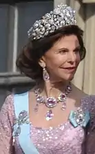 Queen Silva, wearing the Braganza Tiara and the Russian Pink Topaz Demi-Parure, at Crown Princess Victoria's wedding, 2010