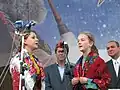 Girls singing (President of Bulgaria Georgi Parvanov is in the background in the centre)