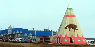 Strip mall and tipi in Rycroft