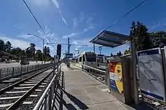 A train stopped on the middle tracks of Southeast Park Avenue station