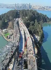 Late Summer, 2012: The westbound link falsework and formswork were disassembled and are now used to construct the eastbound link (center of image).