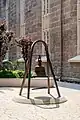 Historic Bell at its new display position between historic church and new community center, ca. 2019.