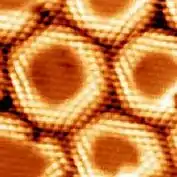 Boron Nitride Nanomesh observed by STM at 77K.