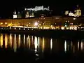 The fortress (background), Salzburg Cathedral (middle), and the Salzach (foreground)