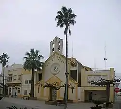 Sant Jaume d'Enveja's main church with its large bell-gable