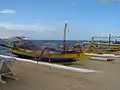 Traditional fishing boats on Sanur beach.